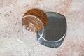 Vintage ÃÂheese dish with plastic dome and metal base on concrete background