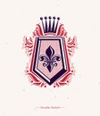 Vintage heraldic insignia made with monarch crown and lily flower royal symbol. Eco friendly product symbol, king quality theme Royalty Free Stock Photo