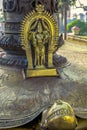 Vintage heritage Bhairav with Kirti mukh on Brass tortoise at Vadakkunathan ShivaTemple Royalty Free Stock Photo