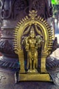 Vintage heritage Bhairav with Kirti mukh on Brass tortoise at Vadakkunathan ShivaTemple Royalty Free Stock Photo