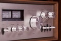 Vintage hi-fi Stereo Amplifier in wooden cabinet