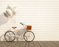 Vintage hipster bicycle with balloon in front of wall