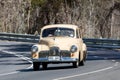 Vintage Holden driving on country road