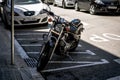 Vintage Honda bike is staying on street of of Barcelona town, Spain