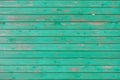 Vintage horizontal wooden planks painted with green colour