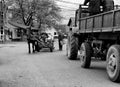Horse and carriage and tractor with trailer in Sapanta, Maramures Romania