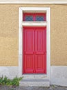 Vintage house entrance painted red wooden door Royalty Free Stock Photo