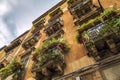 Vintage house with many Balconies with flowers in the City of Catania, Italy