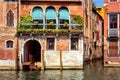 Vintage house, Venice, Italy. Entrance to residential house or hotel by Grand Canal, famous street of Venice