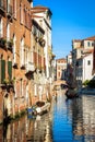 Vintage houses, Venice, Italy. View of facades of residential buildings on old street in Venice center