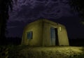 Vintage hut inside jungle with light painting around