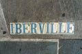 Vintage Iberville Street Sign on the Sidewalk in New Orleans, Louisiana Royalty Free Stock Photo