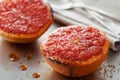 Vintage image of broiled grapefruit with brown sugar and cinnamon on metal surface, healthy dessert is good for breakfast