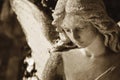 Vintage image of a sad angel on a cemetery Royalty Free Stock Photo