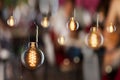 Vintage incandescent Edison type bulbs and window reflections Royalty Free Stock Photo