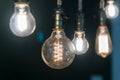 Vintage incandescent Edison type bulbs and window reflections Royalty Free Stock Photo