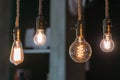 Vintage incandescent Edison type bulbs and window reflections Royalty Free Stock Photo