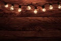 Vintage incandescent light bulbs on wooden wall