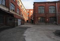 Vintage industrial red brick building in the industrial area of the old European city. Royalty Free Stock Photo