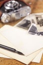 Vintage ink pen, old photos and camera Royalty Free Stock Photo
