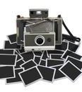 Vintage instant camera with some frame Royalty Free Stock Photo