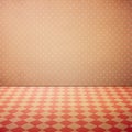 Vintage interior grunge background with checked floor and pink polka dots wall