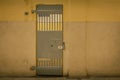 vintage iron jail door in prison building with copy space in cinematic tone