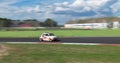 Vintage italian classic Fiat 500 racing car action on racetrack blurred motion background Royalty Free Stock Photo