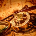 Vintage items on ancient map. Royalty Free Stock Photo