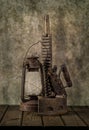 Vintage items kerosene lamp, iron old iron, washing board on a wooden table and art background. Royalty Free Stock Photo