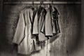 Vintage Jackets Hanging from Bamboo Pole Royalty Free Stock Photo