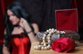 Vintage Jewelry Box with Pearls and rose, Woman in red corset Royalty Free Stock Photo