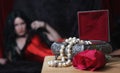 Vintage Jewelry Box with Pearls and rose, Woman in red corset Royalty Free Stock Photo