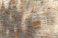 Vintage kasota limestone brick wall texture in colors of orange and pink beige Royalty Free Stock Photo