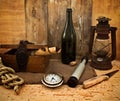 Vintage kerosene lamp, spyglass and a bottle