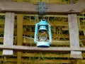 Vintage kerosene lantern lamp in an antique rustic country barn