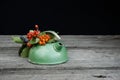 Vintage kettle decorated with blackberries, potassium hawthorn and wild apple