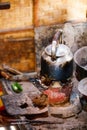 Vintage kettle on fire stove