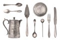 Vintage kettle, spoons, forks, knives and plate isolated on white background. Antique silverware. Retro Royalty Free Stock Photo