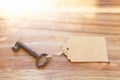 Vintage key and empty tag Royalty Free Stock Photo