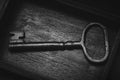 Vintage key inside old treasure chest Royalty Free Stock Photo