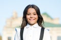 Vintage kid fashion and beauty. schoolgirl in classy retro uniform. small happy girl ready to study. old school. back to Royalty Free Stock Photo