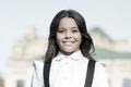 vintage kid fashion and beauty. schoolgirl in classy retro uniform. small happy girl ready to study. old school. back to Royalty Free Stock Photo