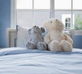 Vintage kids room with dolls and pillows on bed Royalty Free Stock Photo