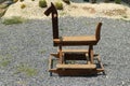 Vintage Kids Toy Rocking Horse Made Of Wood Set Outdoors In Selective Focus Garden