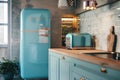 Vintage kitchen with blue retro refrigerator and toaster in a cozy setting. Royalty Free Stock Photo