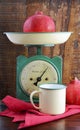 Vintage kitchen scales and tin cups and pans