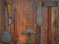 Vintage kitchen utensils over wooden wall Royalty Free Stock Photo