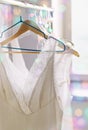 Vintage lace bridal lingerie on hangers