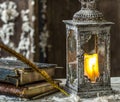 Vintage lamp for the candle and old books